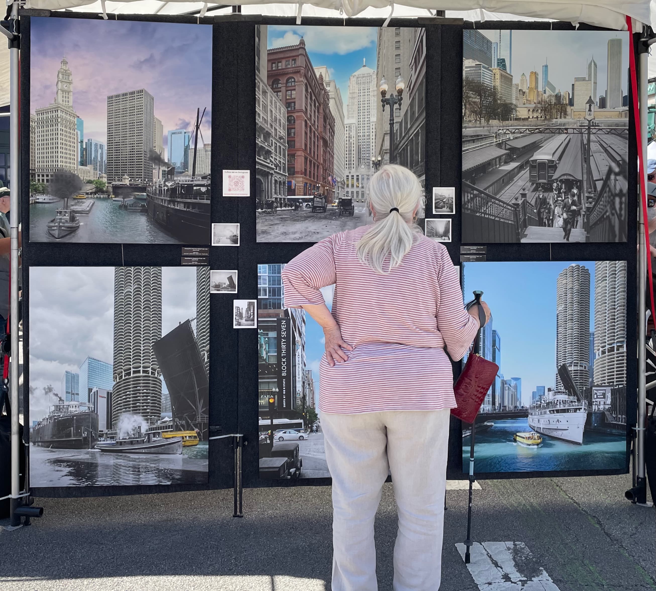 Chicago Then & Now - A woman contemplates photos depicting Chicago's ar...